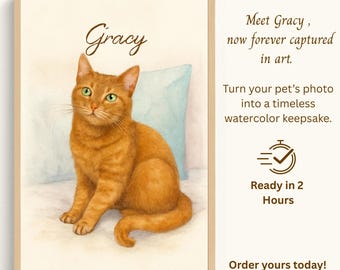 May include: Watercolor painting of an orange tabby cat named Gracy, with green eyes, sitting on a white surface with a light blue pillow in the background. The artwork is framed in a light brown frame. Text on the image says "Meet Gracy, now forever captured in art."