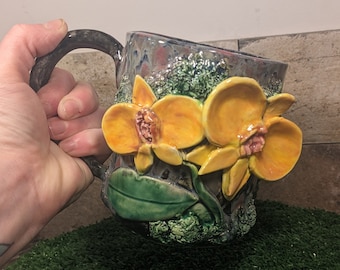 Orchid theme hand built pottery mug Orange and Yellow orchid blooms 12oz