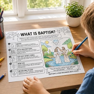 May include: A child coloring a "What is Baptism?" coloring page with a blue pencil. The page features illustrations of Jesus' baptism and related Bible verses. Colored pencils and a small potted plant are visible.