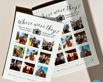 May include: Two white paper game cards with the text "Where were they?" and "Whoever gets the most correct guesses wins!" Each card has a grid of photos and space for the player's name and score. The game is about guessing where William & Emily were in each photo.