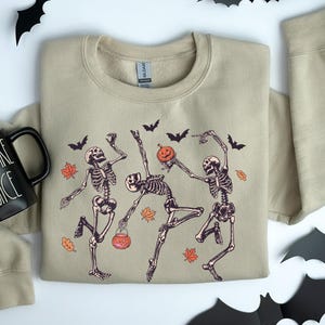Dancing Skeleton Halloween Sweatshirt: Spooky Season Pullover