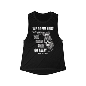 Tu dorastaliśmy, tu przylecieliście, odejdźcie: Muscle Tank
