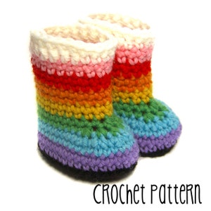 May include: Rainbow crochet baby booties with a white top and black soles. CROCHET PATTERN text is visible at the bottom of the image.