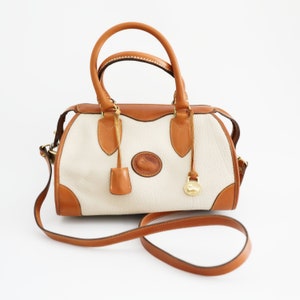 Vintage Dooney and Bourke Ivory Pebble leather and Tan color leather trim Shoulder Bag