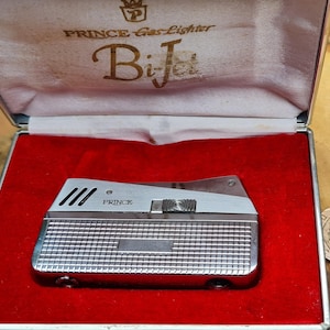 Vintage Prince Bi Jet Lighter: Collectible Japanese Classic (Needs Repair)