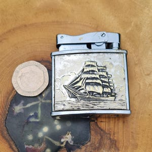 Tallships themed vintage petrol lighter by &quot;Record&quot; of Austria/Germany 1950/60 In full working Condition . Nautical