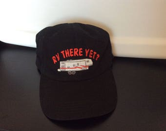 Mesh back adjustable RV hat. 5th wheel and drinks well is aSoft Style solid Baseball/Polo Cap adjustable back.