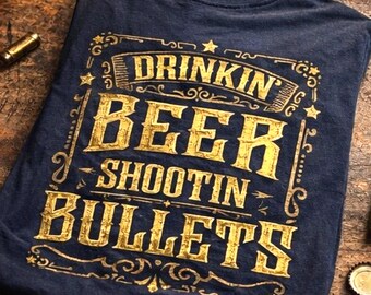 Funny Gun Lover Shirt | Drinkin Beer Shootin Bullets | Western Ammo Typography T-Shirt