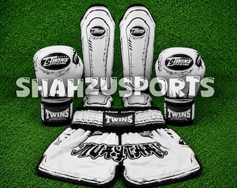 Conjunto de entrenamiento de boxeo Twins: guantes de boxeo, espinilleras y pantalones cortos de Muay Thai. Equipo para entrenamiento de kickboxing y sparring.
