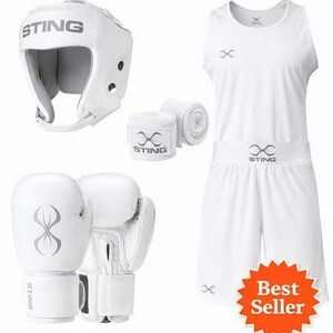 May include: White boxing set including gloves, headgear, wraps, and a matching outfit. The set features white boxing gloves with a stylized design, a headguard, and hand wraps. The outfit includes a tank top and shorts.