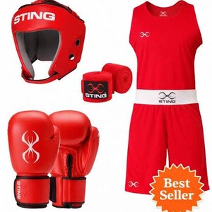 May include: A red boxing set including a headguard, gloves, hand wraps, and a matching outfit. The gloves and headgear feature the "STING" logo. The outfit includes a top and shorts with a white waistband.