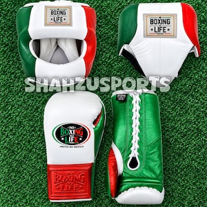 May include: A boxing headgear and a pair of boxing gloves featuring a green, white, and red color scheme. The gear displays the text BOXING NO LIFE SQUAD and NO BOXING NO LIFE HECHO EN MEXICO. The brand name SHAHZUSPORTS is visible in the center.