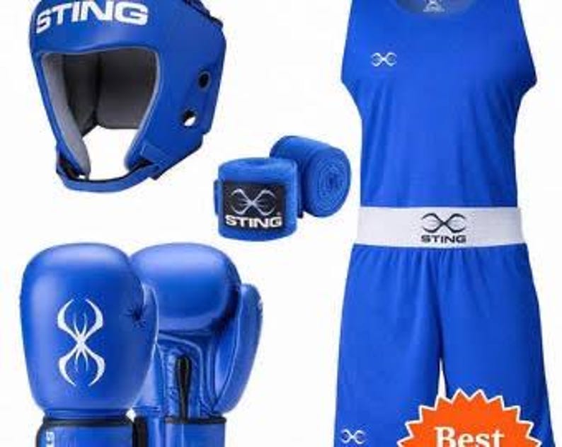 May include: A blue boxing set including a head guard, hand wraps, gloves, and a sleeveless top and shorts. The set features the "STING" logo and is designed for boxing training and competition.