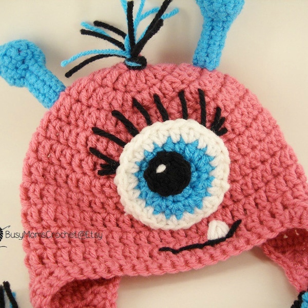 Handmade Crochet Baby girl monster hat with antennae and eyelashes, sizes 0 months to toddler size