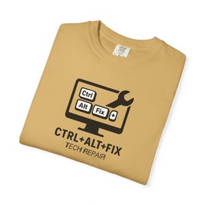 May include: A yellow t-shirt with a black computer monitor graphic and the text "CTRL+ALT+FIX TECH REPAIR".