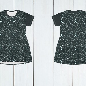 May include: A dark green dress with a white celestial pattern of constellations, moons, and stars. The dress has short sleeves and a scoop neck. The front and back of the dress are displayed, with the word "FRONT" and "BACK" in the lower corners.