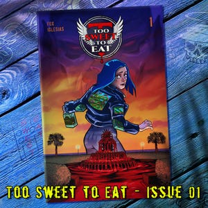 May include: Comic book cover for "Too Sweet to Eat - Issue 01." The artwork features a woman with blue hair, a black jacket, and a bottle, set against a sunset backdrop with a fountain. The title is prominently displayed with a winged logo.