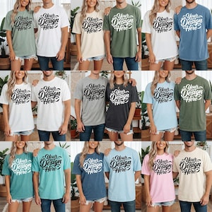 May include: A collection of various colored t-shirts. Each shirt features the text "Your Design Here" in a stylish script. The shirts are displayed on models, showcasing a range of colors including white, green, blue, and pink.