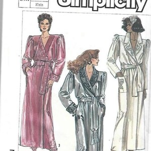 May include: Simplicity sewing pattern number 7186 for three long robes. The pattern includes instructions for a pink robe, a silver robe, and a white robe. The pattern is for sizes small, petite, and klein.