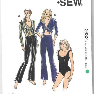 May include: A vintage Kwik Sew sewing pattern, pattern number 2632, featuring illustrations of three different outfits. The outfits include a long-sleeved top with flared pants, a tie-front top with flared pants, and a black bodysuit. Sizes XXS-M-L.