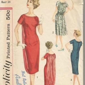 May include: Vintage Simplicity sewing pattern for a dress, featuring three different styles. The pattern number is 2764, size 14, bust 34. The pattern is printed on a white background with illustrations of women wearing the dresses.