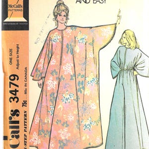 May include: McCall's 3479 sewing pattern for a Misses' caftan jumpsuit. The pattern features a floral print caftan in peach, pink, and blue. The text "Quick and Easy" is displayed at the top. The pattern is one size and adjustable to height.