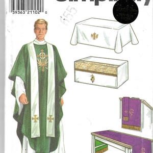 May include: Simplicity sewing pattern 7950 for liturgical vestments. The envelope features illustrations of a green chasuble with a white stole, a white altar cloth with gold embroidery, a white box, and a purple lectern hanging and table runner.