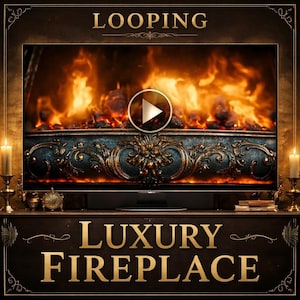 May include: A digital fireplace display with a realistic fire effect. The screen is framed by ornate, dark teal and gold detailing. The words "LOOPING" and "LUXURY FIREPLACE" are displayed in gold lettering.