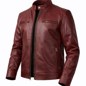 A burgundy leather jacket with a stand-up collar and a full-length zip. The jacket features two zipped chest pockets and two zipped hand pockets. The sleeves have a tailored fit. The jacket is made of smooth, supple leather.