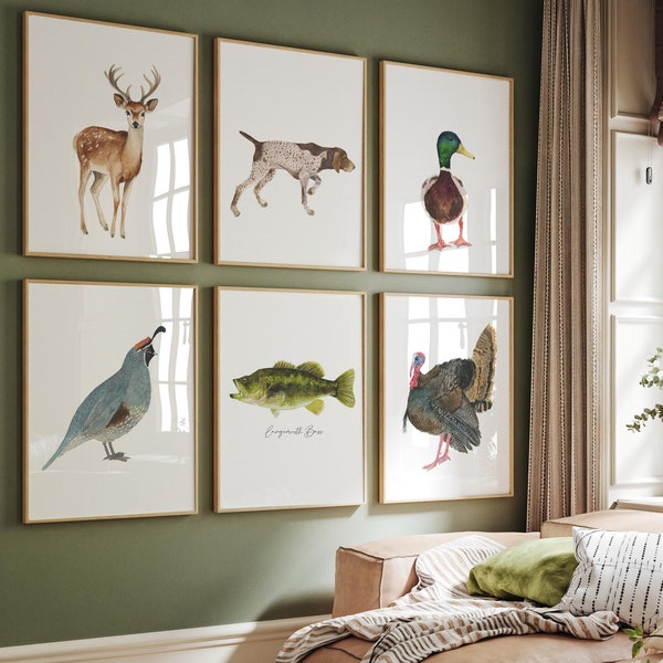 May include: A set of six framed wall art prints featuring watercolor illustrations of a deer, a hunting dog, a mallard duck, a quail, a largemouth bass with the text Largemouth Bass, and a wild turkey, all displayed in light wood frames.