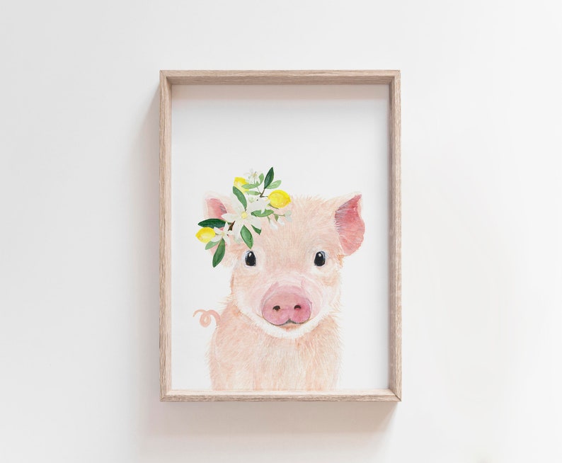 May include: A watercolor painting of a pig wearing a flower crown with white flowers and yellow lemons. The pig is pink and has a sweet expression.