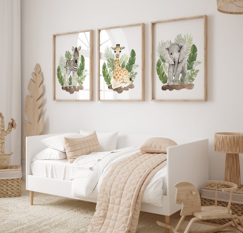 May include: Three framed watercolor illustrations of a zebra, giraffe, and elephant in a jungle setting. The illustrations are in a light green, brown, and gray color palette.