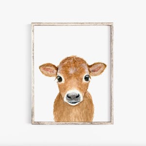 May include: A watercolor painting of a brown calf with big, curious eyes. The calf is looking directly at the viewer with its head tilted slightly to the side. The background is white.