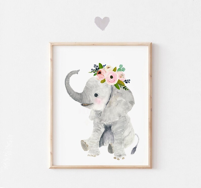 May include: A watercolor painting of a gray elephant wearing a pink and white flower crown. The elephant is sitting with its trunk raised and its ears spread out.
