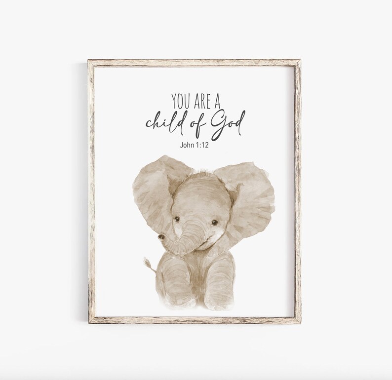 May include: A framed print featuring a watercolour illustration of a brown elephant and the text "You are a child of God" with the scripture reference "John 1:12".