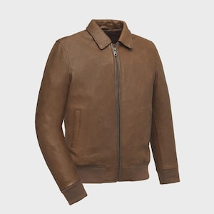 May include: A brown leather jacket with a collared neckline and a full-length zipper. The jacket features a ribbed knit hem and cuffs, and a small pocket on the left side. The jacket is a medium brown color.