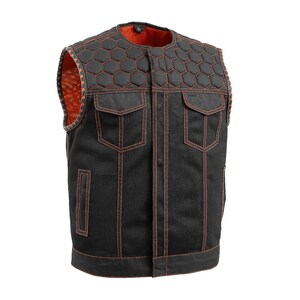 May include: Black mesh vest with orange stitching and accents. Features two front pockets, a quilted honeycomb pattern on the shoulders, and an orange interior lining. A stylish and functional outerwear piece.