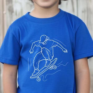 Minimalist Skateboarder Graphic Tee: Urban Streetwear Shirt