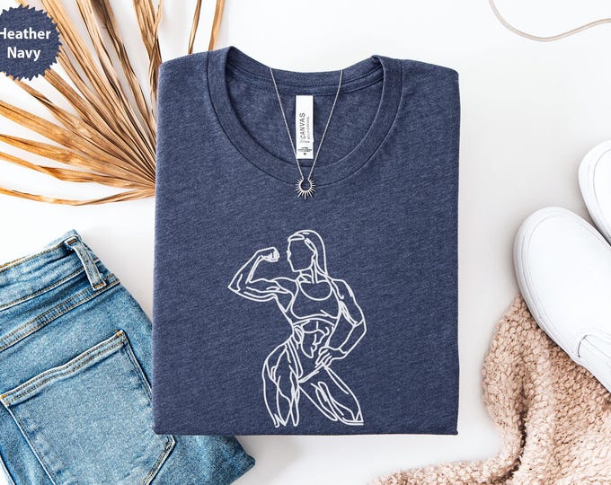 T-shirt fitness femme, silhouette musculation, cadeau pour amateur de sport, design femme forte, chemise d'entraînement motivation, T-shirt athlète