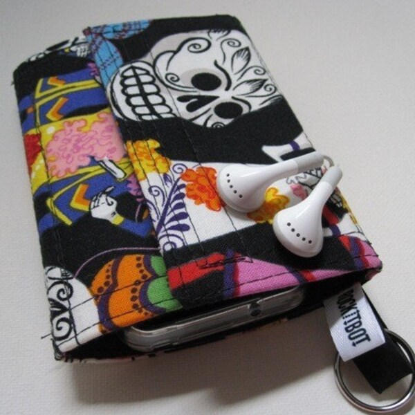 Nerd Herder odds and ends gadget wallet in Day of the Dead- iPod, Droid, Zune, MP3, metronome, digital camera, earbuds, SD cards, USB, extra batteries, guitar picks, IDs, credit cards, phone- one wallet holds whatever you want to round up.