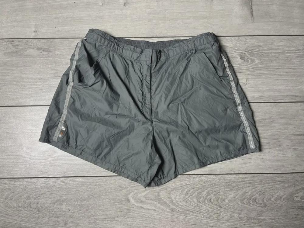 Short Nike running an 2000 taille Medium