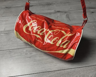 Bolsa deportiva vintage Coca Cola estampada, talla única.