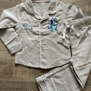 Blue/ orange dog personalised embroidered pyjamas