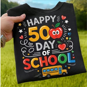May include: Black crew neck sweatshirt with the text "HAPPY 50 DAY OF SCHOOL" in white, yellow, red, and green. The design includes a red apple, hearts, stars, and a yellow school bus.