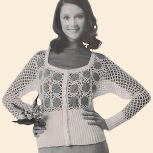 May include: A vintage black and white image of a woman wearing a white crochet cardigan with floral detailing. The cardigan has a square neckline and button closure. The image includes the text "Knot Forgotten PATTERNS" in the upper left corner.