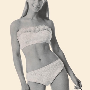 May include: A vintage black and white image of a crocheted bikini set. The top is a bandeau style with a ruffled edge, and the bottoms are high-waisted. The image includes the text "Knot Forgotten PATTERNS" in the upper left corner.