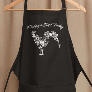 May include: A set of three ceramic mugs with a speckled, matte finish. The mugs are in shades of blue, green, and white. Each mug has a rounded handle and a simple, modern design. The mugs are suitable for coffee, tea, or other beverages.