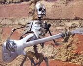 Zombie Skeleton Playing Electric Bass Guitar Metal Sculpture - Free Shipping in US