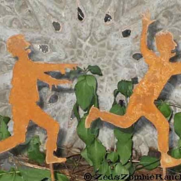 Zombie Chasing a Victim - Plant Sticks - Free Shipping to US