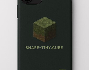 May include: Dark green phone case featuring a pixelated cube design in shades of green and brown. The text "SHAPE-TINY.CUBE" is printed below the cube. A small logo is in the bottom right corner.